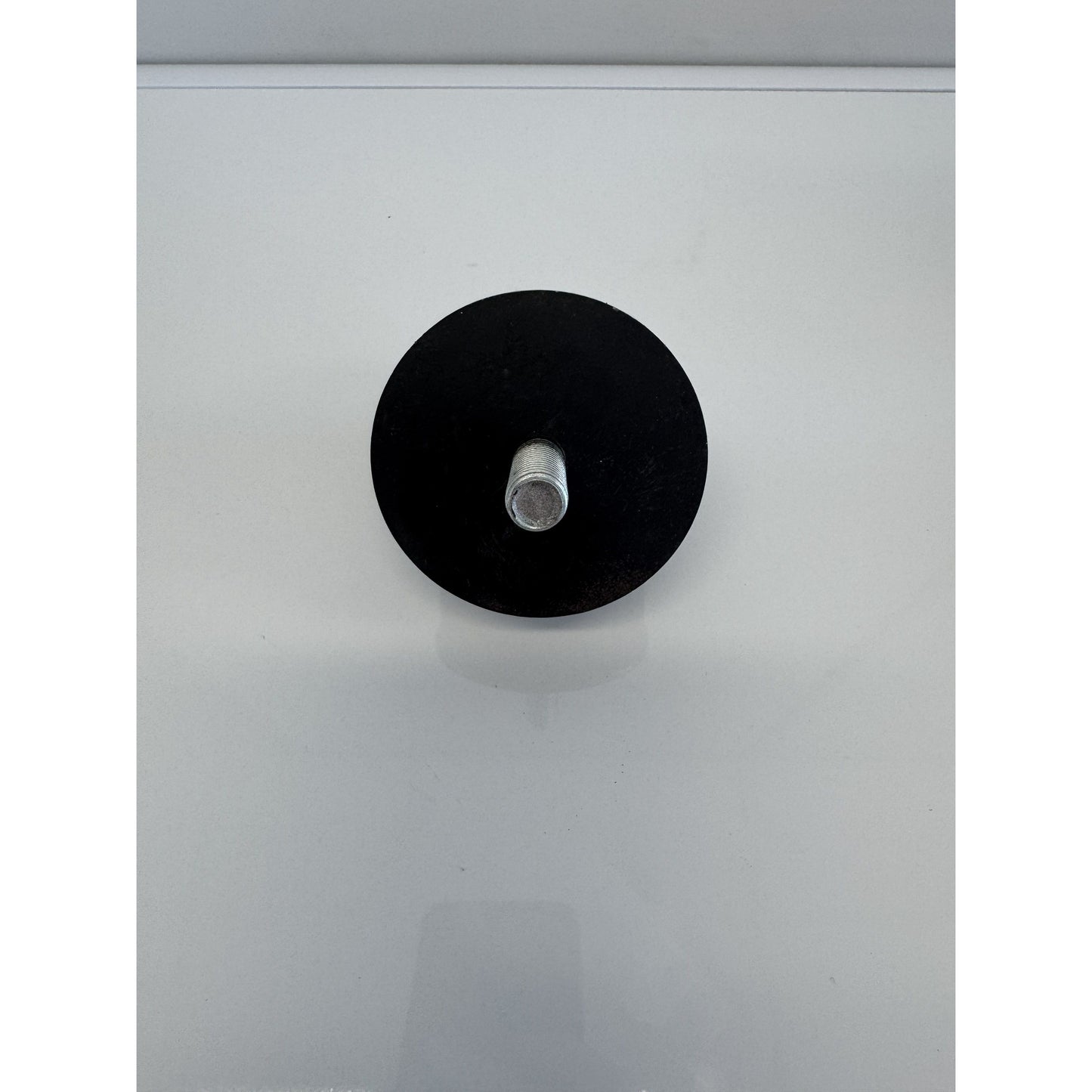 Large rear mount rubber mount by RTE Custom Trucks, showcasing durable rubber design for vehicle support and stability.