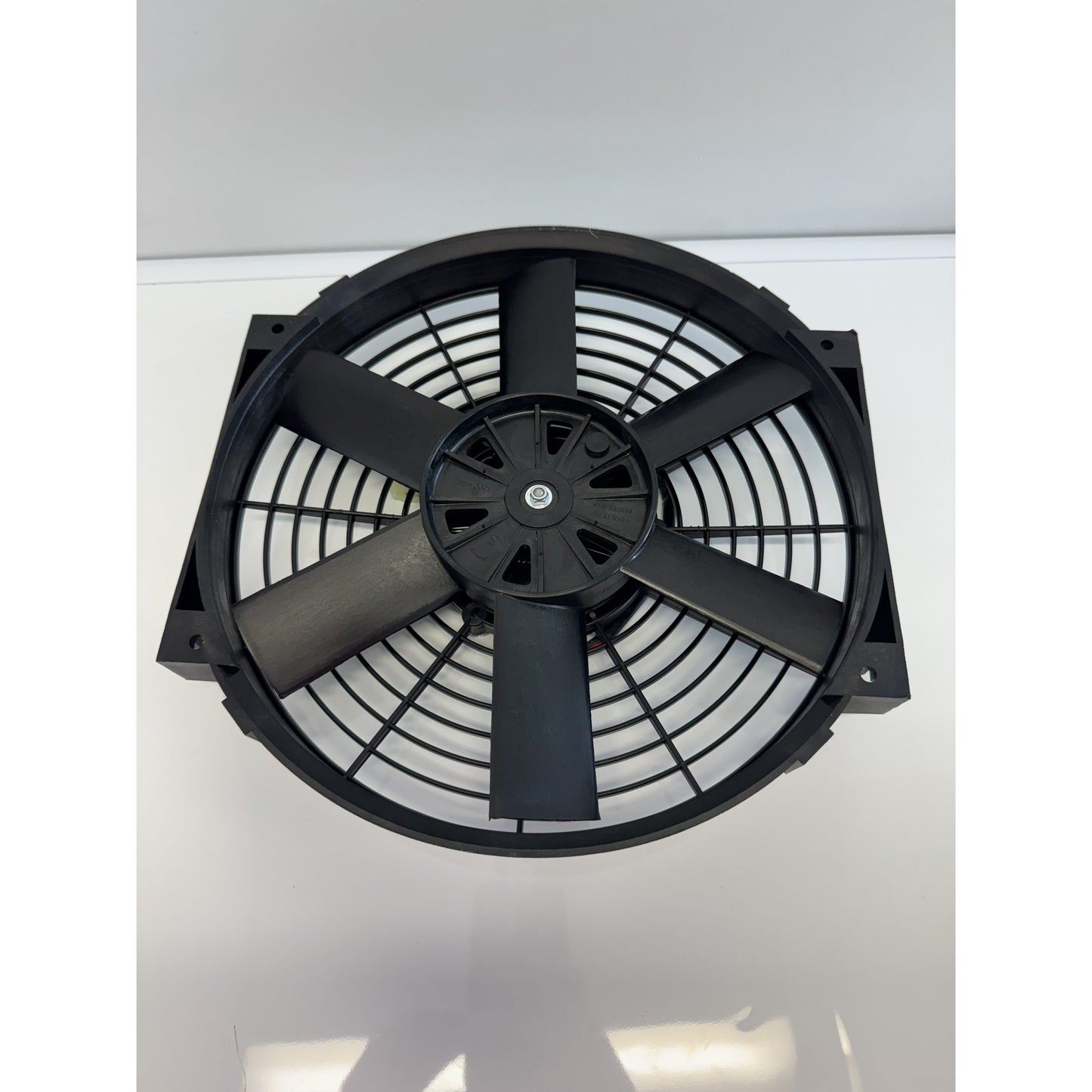 RTE Custom Trucks 24V condenser fan with durable blades and a compact design for efficient cooling in vehicles.