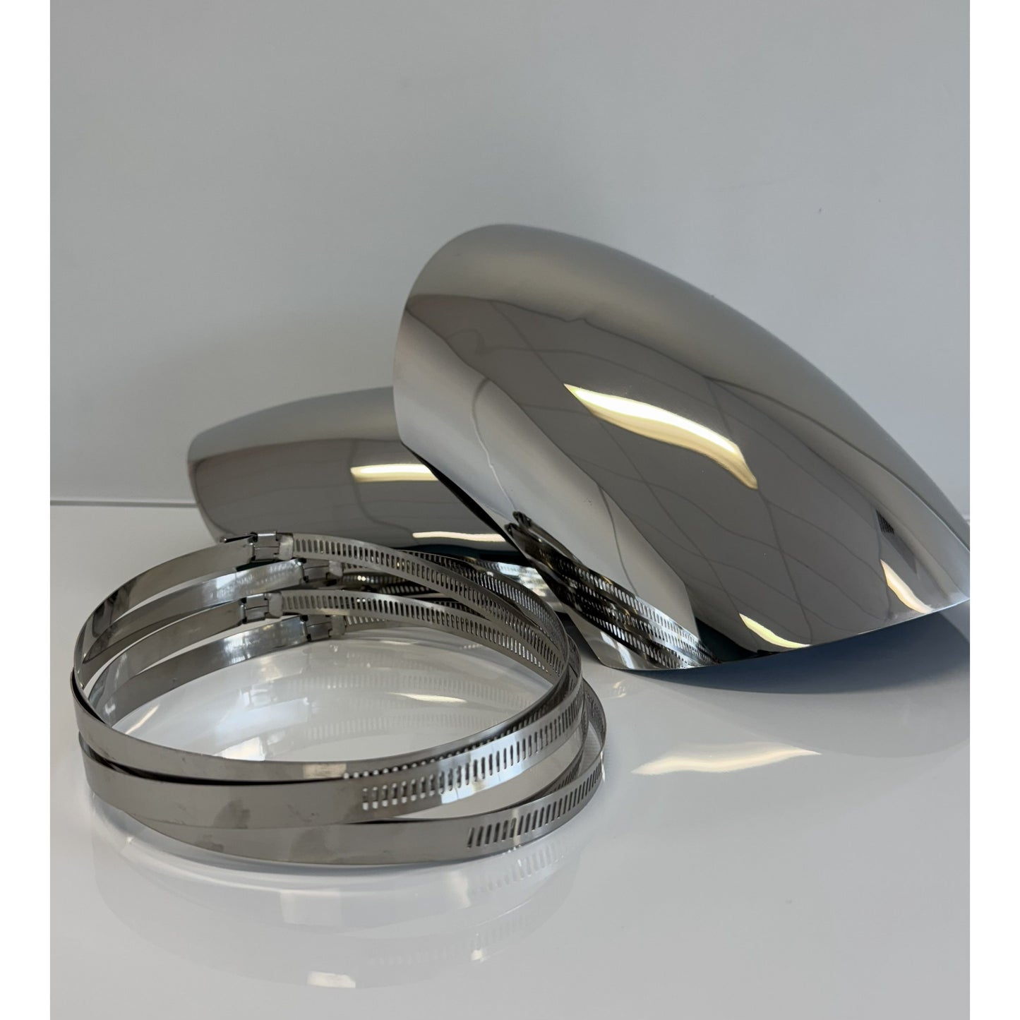Stainless air intake hose cover by RTE Custom Trucks, showcasing a sleek, polished finish and durable design.