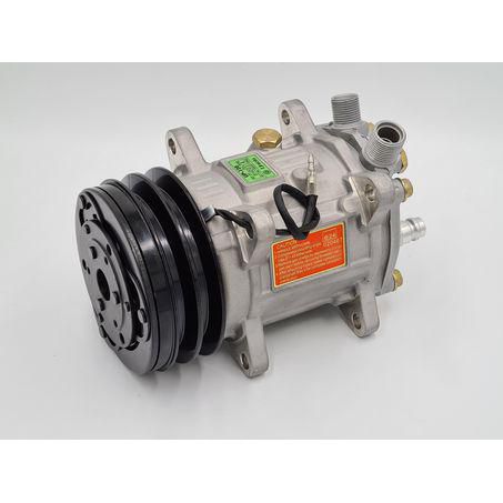 RTE Custom Trucks Sleeper Air 24V Compressor with a compact design and durable build, shown on a workbench.