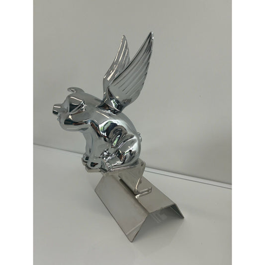 RTE Custom Trucks pig hood ornament mounting bracket mounted on a vehicle, showcasing sturdy design and fit.