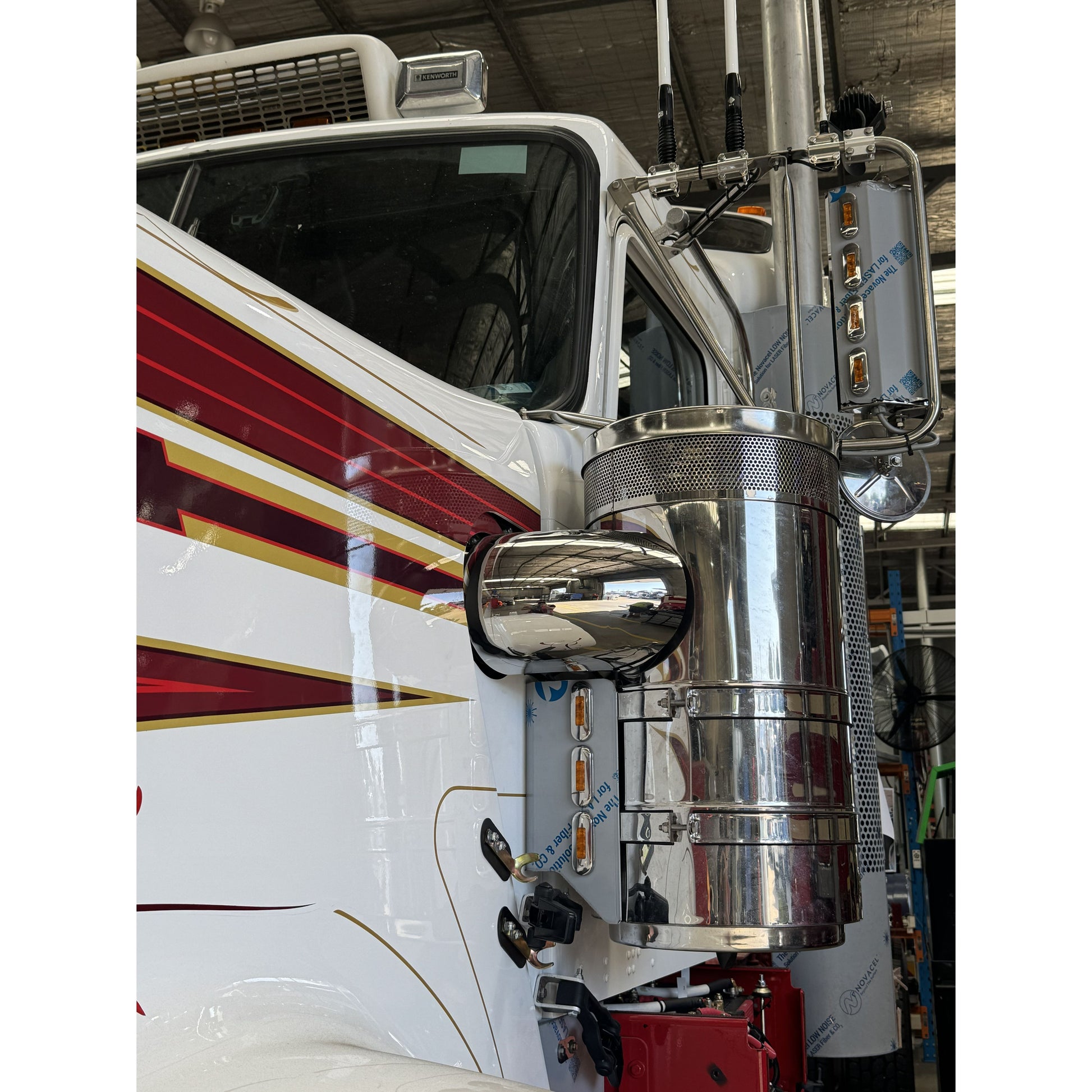 Stainless air intake hose cover by RTE Custom Trucks, showcasing a sleek design and durable finish for enhanced performance.