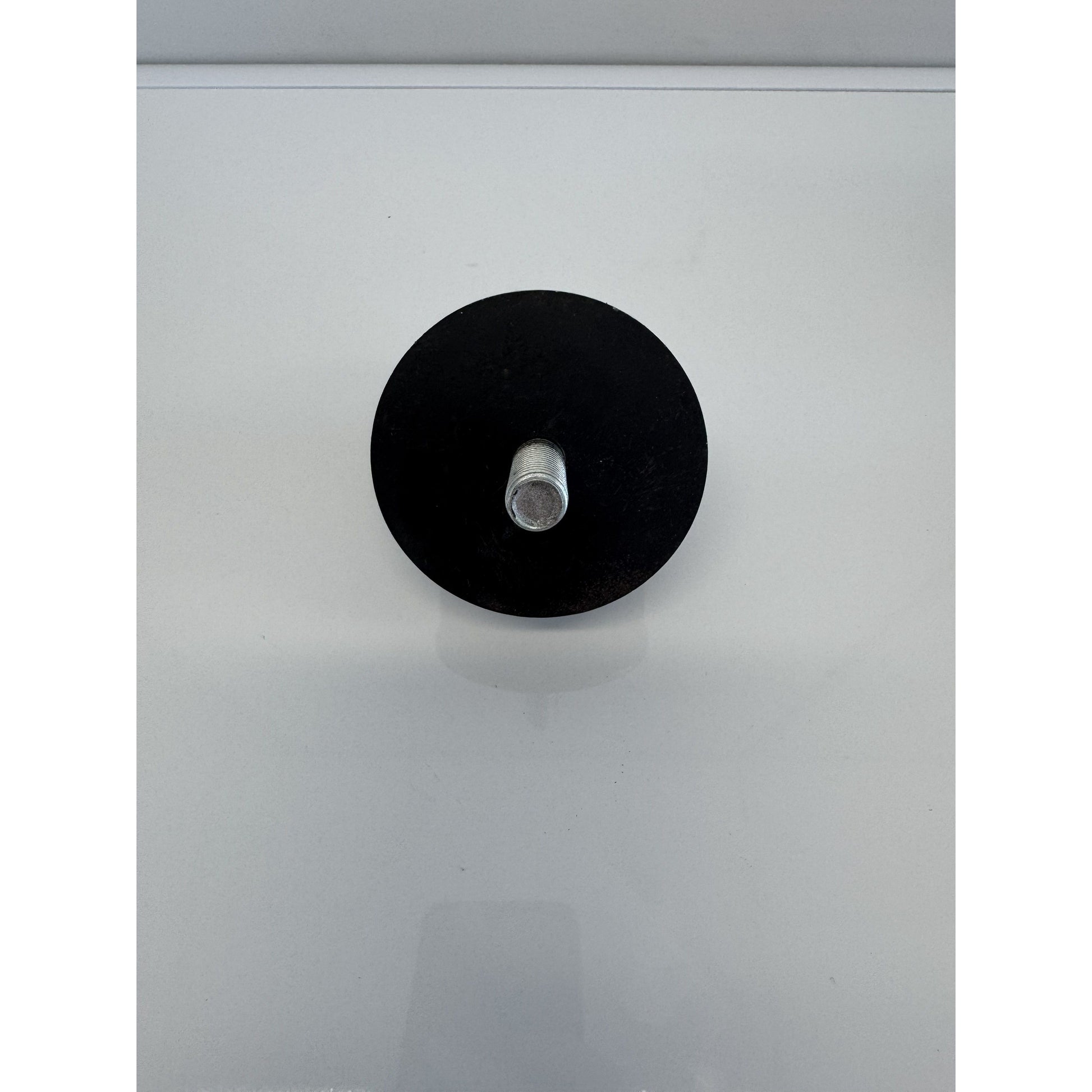 Large rear mount rubber mount by RTE Custom Trucks, showcasing durable rubber design for vehicle support and stability.