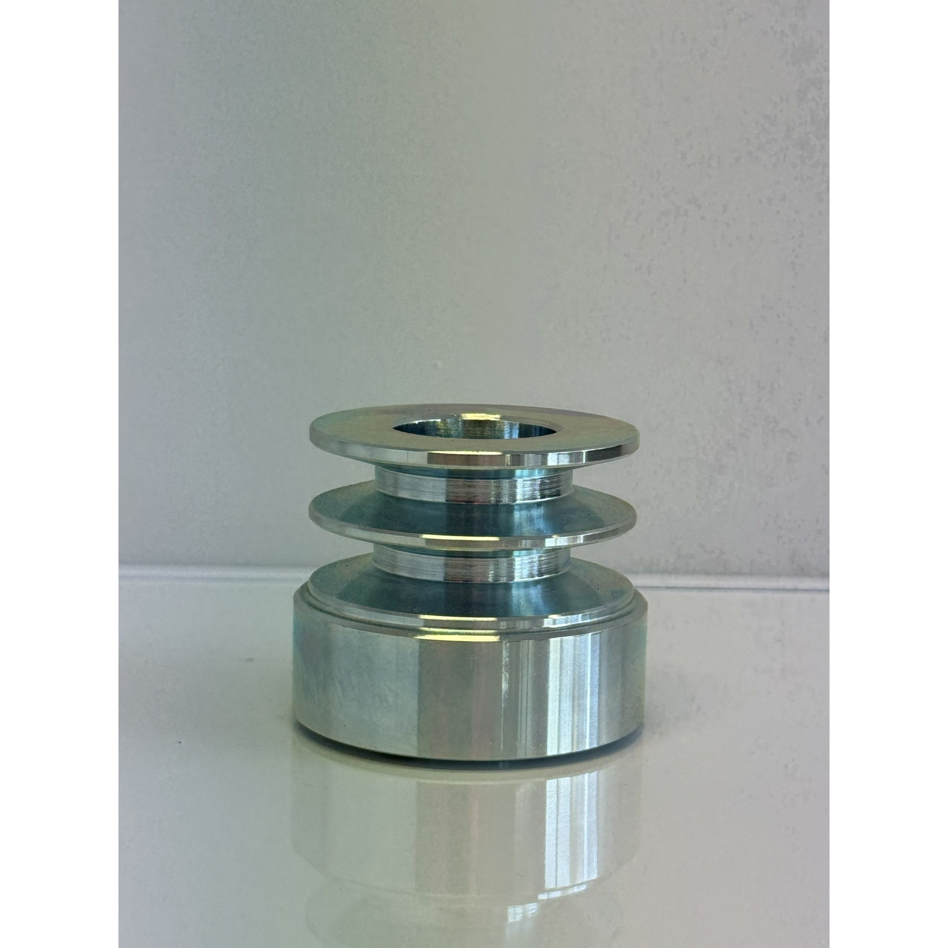 Kohler engine pulley by RTE Custom Trucks, showcasing a durable design with grooves and mounting holes for easy installation.