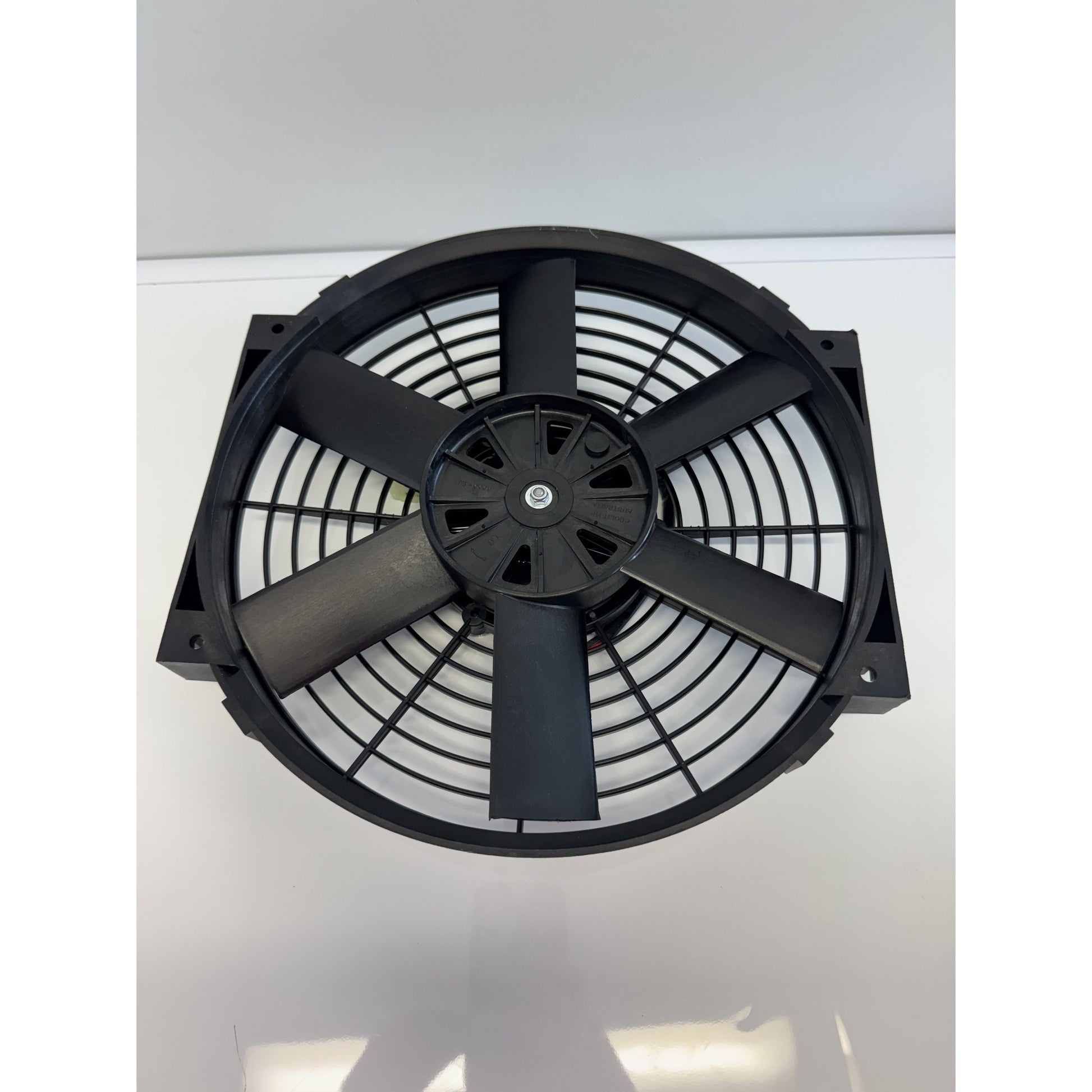 RTE Custom Trucks 24V condenser fan with durable blades and a compact design for efficient cooling in vehicles.